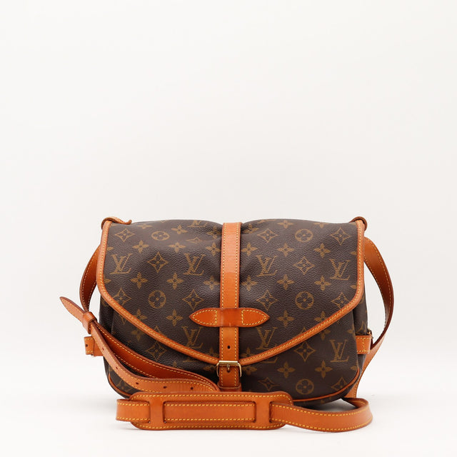 Vue de profil Louis Vuitton Saumur 30 Toile Monogramme occasion authentique — AMANA Vintage