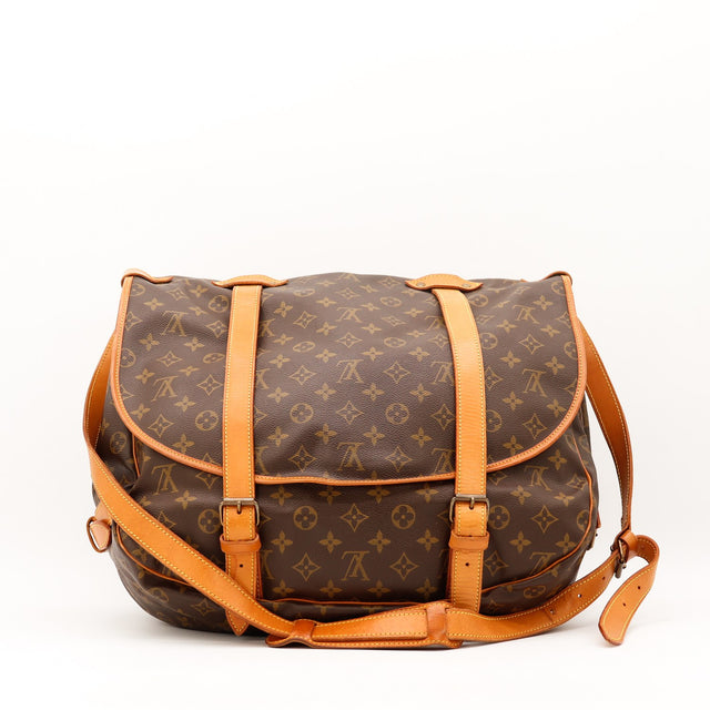 Vue de profil Louis Vuitton Saumur 35 Toile Monogramme occasion authentique — AMANA Vintage