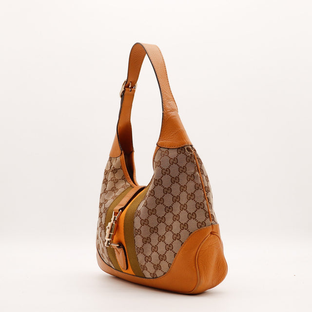 Gucci New Jackie vue de trois quarts toile monogrammée cuir grené cognac — AMANA Vintage