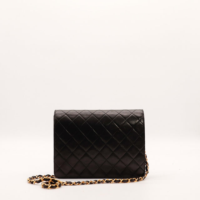 Dos sac Chanel Classique Timeless cuir matelassé noir vintage occasion — AMANA Vintage