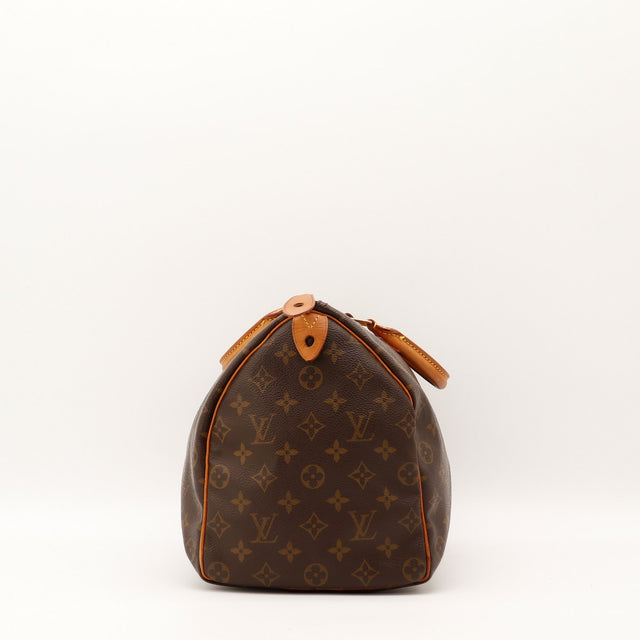 Sac Louis Vuitton Speedy 35 vue de côté cuir vachette patine caramel — AMANA Vintage
