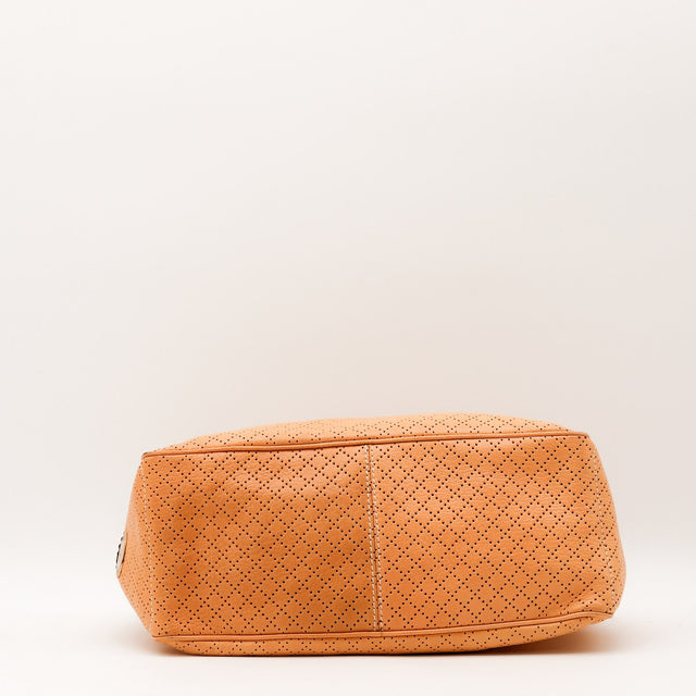 Détail des rivets dorés Céline Boogie cuir de veau perforé camel occasion authentique — AMANA Vintage