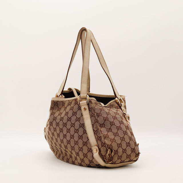 Sac Gucci Tote toile monogrammée vue de trois quarts occasion authentique — AMANA Vintage