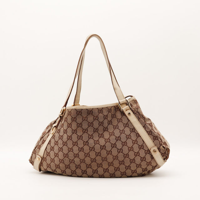 Sac Gucci Tote garnitures cuir ivoire vue de côté occasion authentique — AMANA Vintage