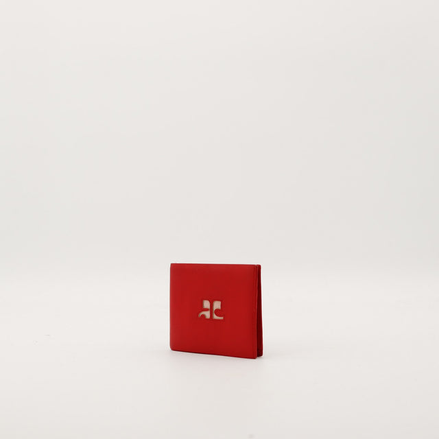 Portefeuille Courrèges rouge vue trois quarts logo AC découpé — AMANA Vintage