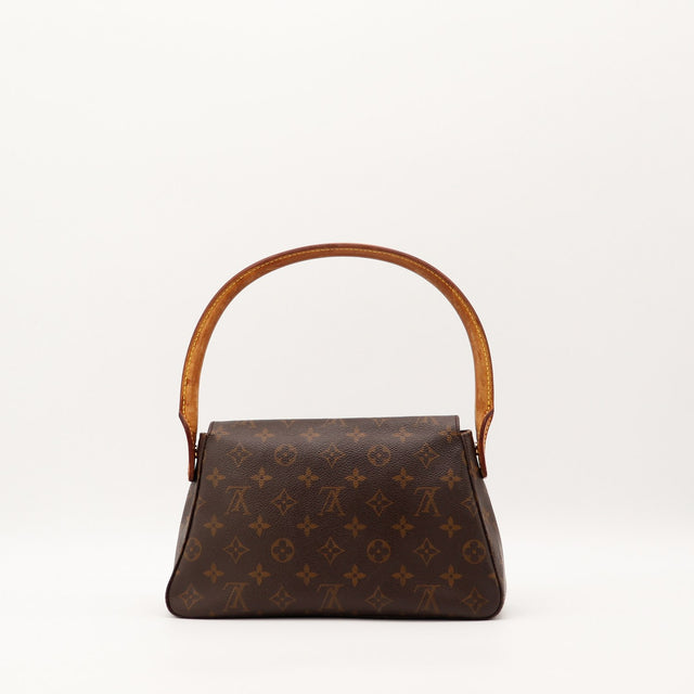 Détail coins toile Monogram Louis Vuitton Mini Looping occasion — AMANA Vintage