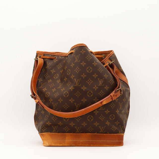 Vue de profil Louis Vuitton Noé Toile Monogramme occasion authentique — AMANA Vintage