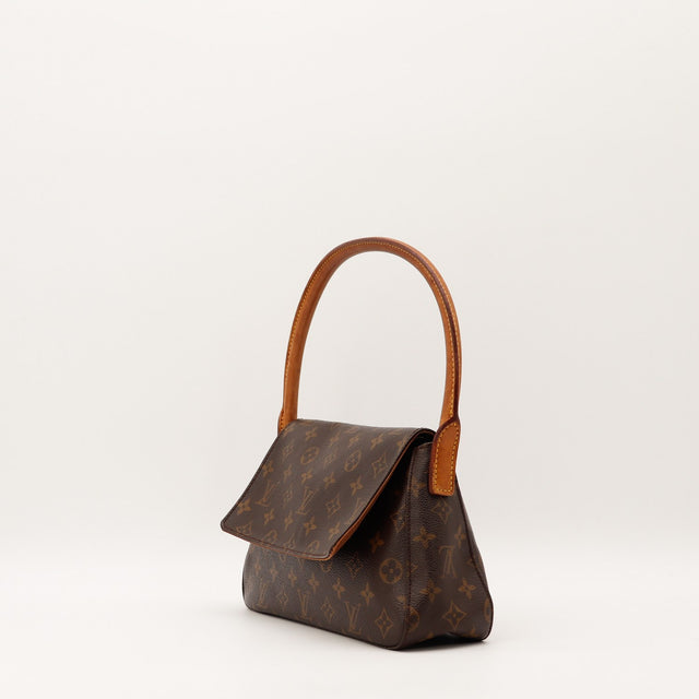 Détail anse vachette patine prononcée Louis Vuitton Mini Looping — AMANA Vintage