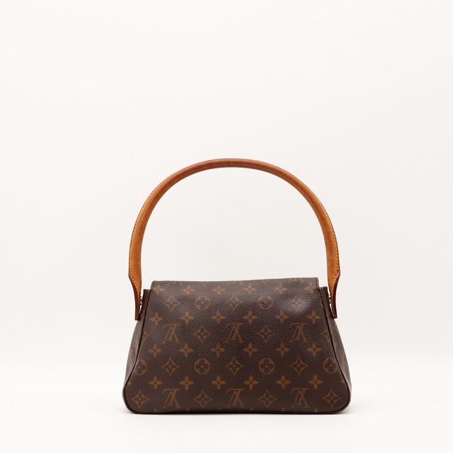 Détail coins toile Monogram Louis Vuitton Mini Looping occasion authentique — AMANA Vintage