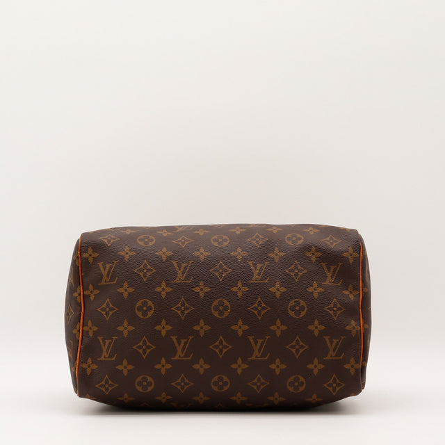 Détail de la fermeture Louis Vuitton Speedy 30 Toile Monogramme occasion authentique — AMANA Vintage