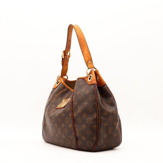 Détail anse cuir vachette patine sombre Louis Vuitton Galliera PM — AMANA Vintage