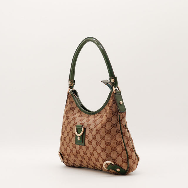 Détail anneau D doré et cuir verni vert Gucci Tote Horsebit — AMANA Vintage