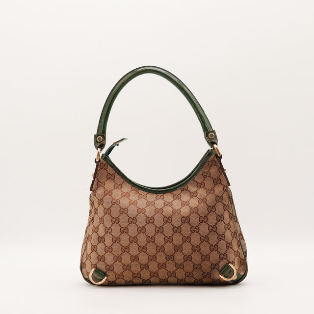 Détail anse cuir verni vert Gucci Tote Horsebit occasion authentique — AMANA Vintage