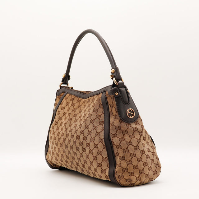 Coins et bordures cuir Gucci Hobo Scarlett toile beige occasion authentique — AMANA Vintage