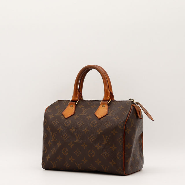 Vue de trois-quarts Louis Vuitton Speedy 25 Toile Monogramme occasion authentique — AMANA Vintage