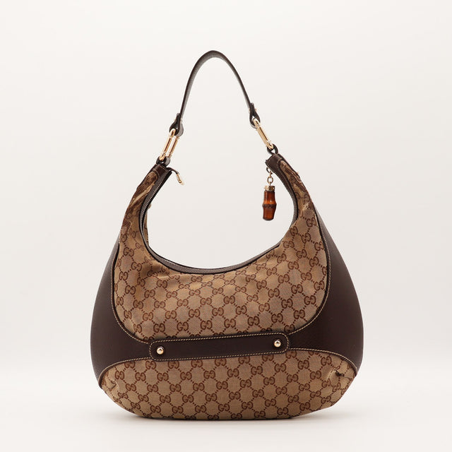Détail anse cuir marron Gucci Hobo Bambou occasion authentique — AMANA Vintage