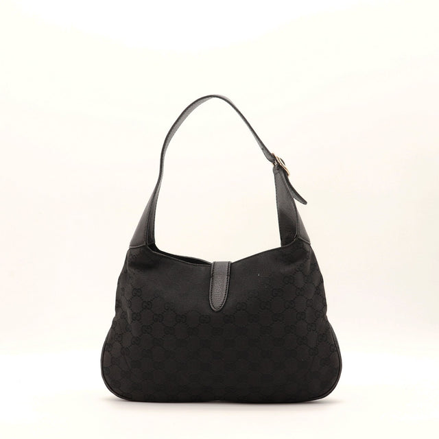 Détail anse cuir Gucci Jackie noir occasion authentique — AMANA Vintage