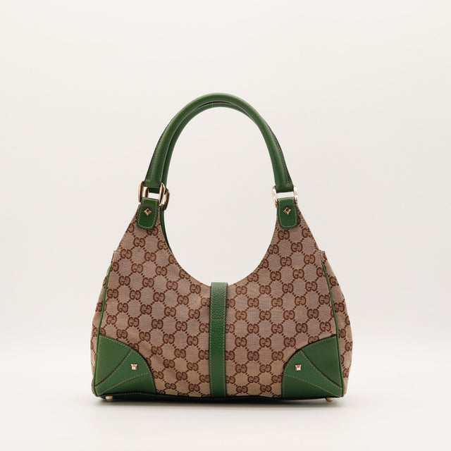 Détail cuir vert et coins Gucci Jackie occasion authentique — AMANA Vintage