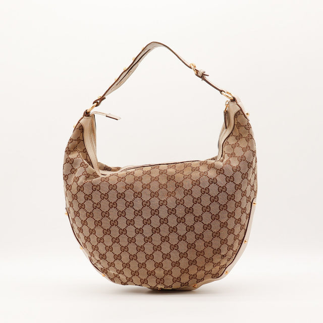Détail clous dorés Gucci Hobo toile GG occasion authentique — AMANA Vintage