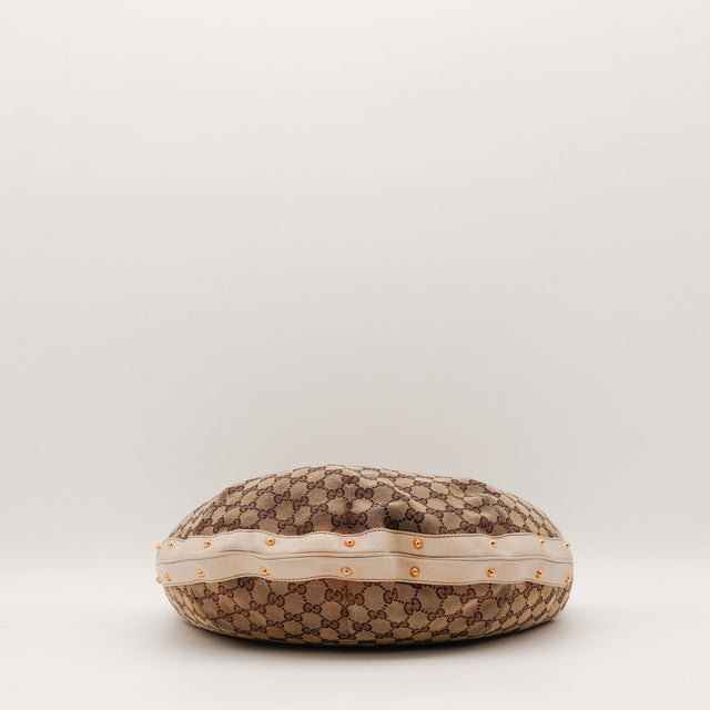 Détail coins cuir Gucci Hobo toile GG occasion authentique — AMANA Vintage
