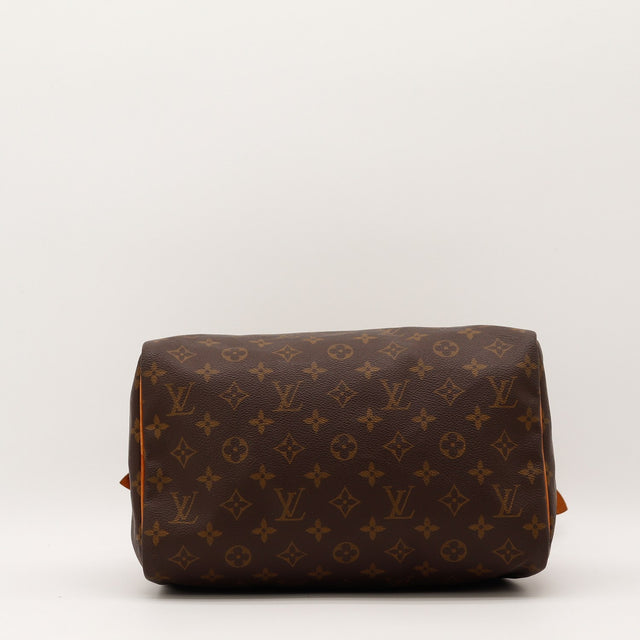Détail de la fermeture éclair Louis Vuitton Speedy 25 Toile Monogramme occasion authentique — AMANA Vintage