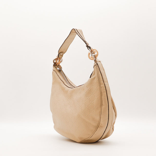 Détail breloques Interlocking G bicolores Gucci Twins Hobo — AMANA Vintage
