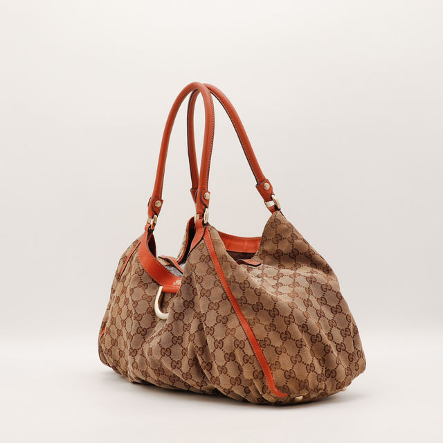 Détail cuir orange et anneau D-Ring doré Gucci Tote Horsebit — AMANA Vintage