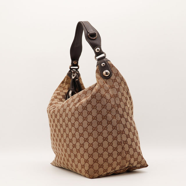 Détail anse cuir marron et billes argentées Gucci Hobo — AMANA Vintage