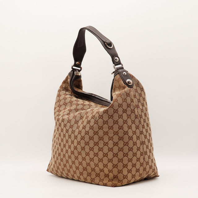 Détail argenterie anneau mors Gucci Hobo — AMANA Vintage