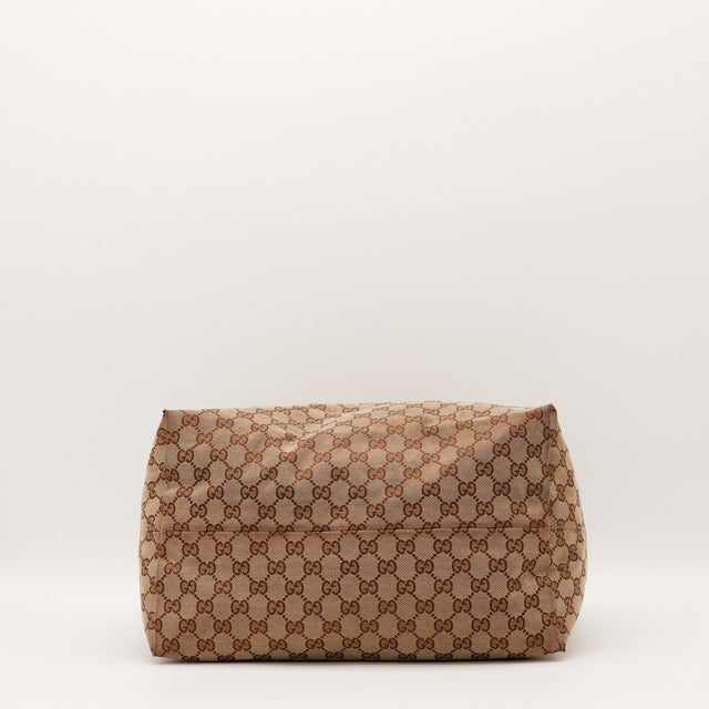 Vue de côté Gucci Hobo toile GG beige occasion authentique — AMANA Vintage