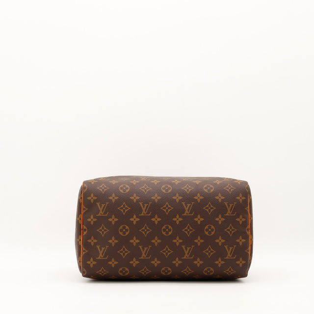 Détail zip et tirette Louis Vuitton Speedy 30 languette vachette caramel — AMANA Vintage