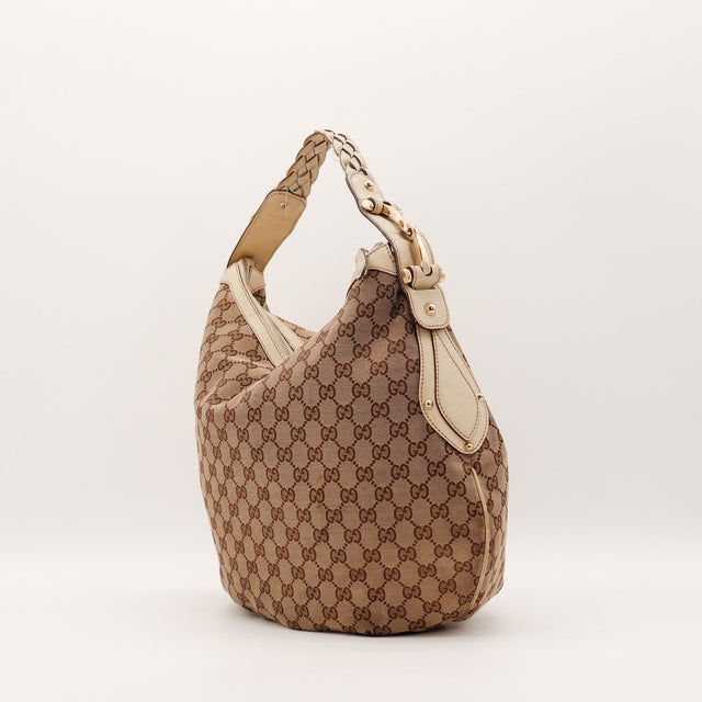 Vue de dos Gucci Hobo Horsebit toile GG beige occasion authentique — AMANA Vintage