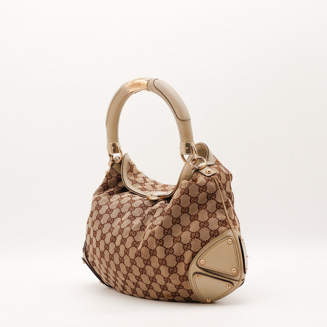 Detail anse rigide cuir Gucci Indy Hobo occasion authentique — AMANA Vintage