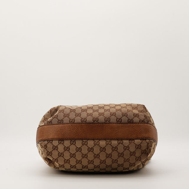 Détail zip et anse tressée Gucci Hobo Bambou cuir marron — AMANA Vintage