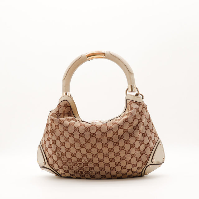 Detail pompons à embouts bambou Gucci Indy Hobo occasion authentique — AMANA Vintage