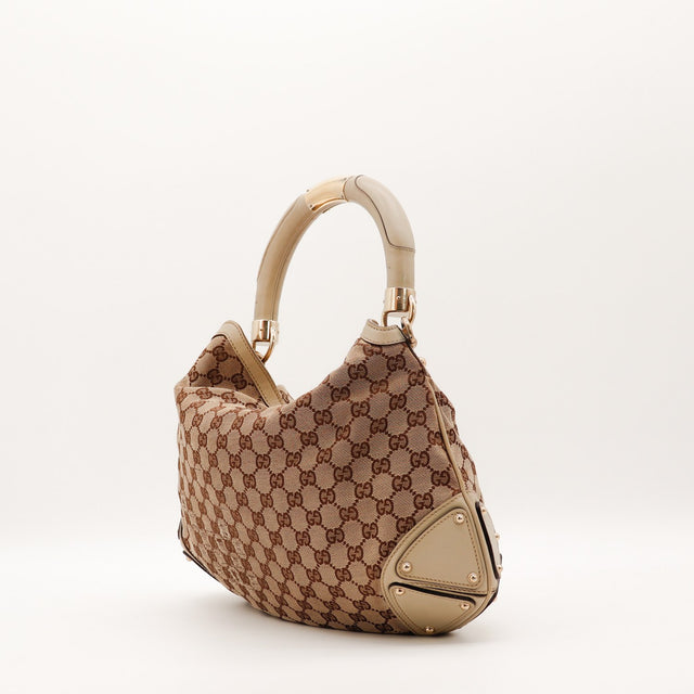 Detail toile effilochée côté Gucci Indy Hobo occasion authentique — AMANA Vintage