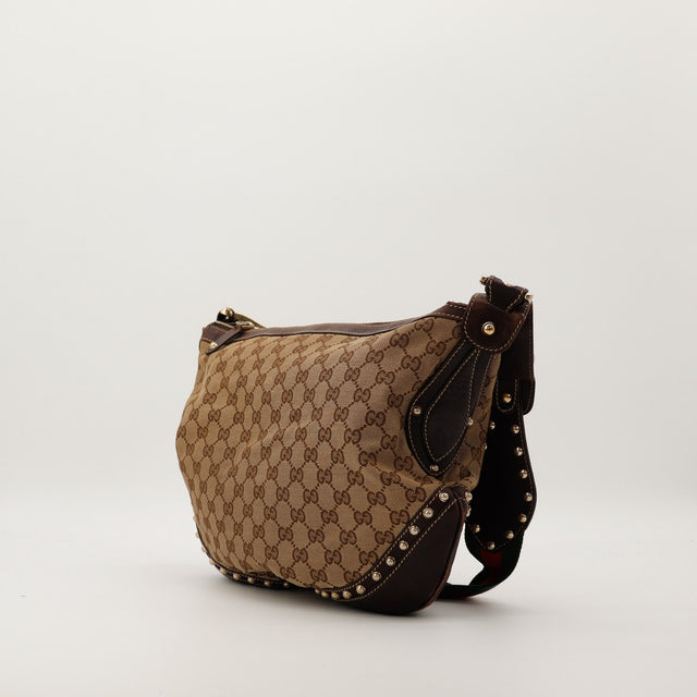 Vue de profil Gucci Hobo Web canvas GG bandoulière réglable occasion — AMANA Vintage