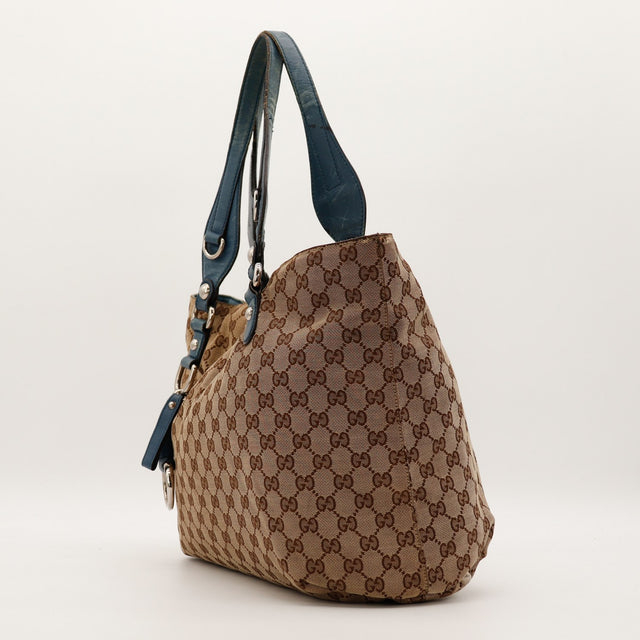 Vue de profil Tote Horsebit Gucci toile GG Canvas cuir bleu occasion — AMANA Vintage