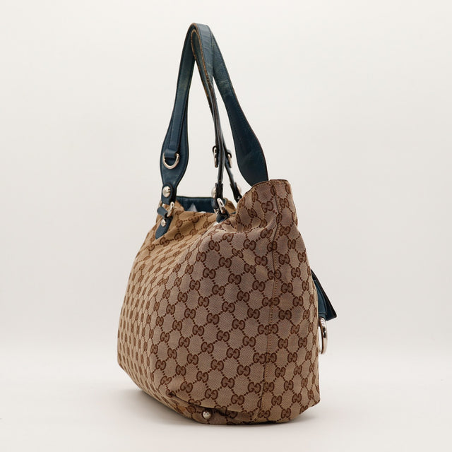 Vue de profil droit Tote Horsebit Gucci GG Canvas occasion — AMANA Vintage