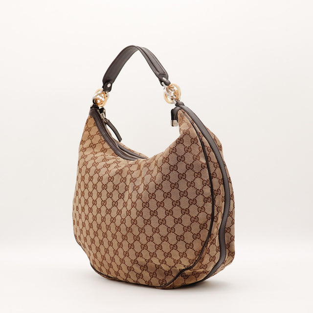 Sac Gucci Twins Hobo toile monogrammée vue de côté occasion authentique — AMANA Vintage