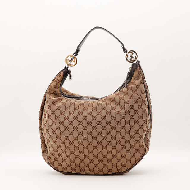 Détail breloques Interlocking G bicolores Gucci Twins Hobo — AMANA Vintage