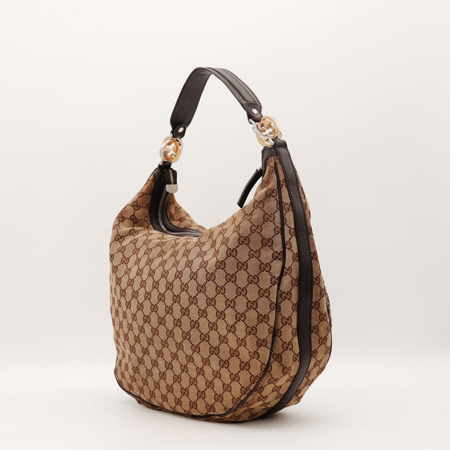 Détail anse cuir marron Gucci Twins Hobo occasion authentique — AMANA Vintage