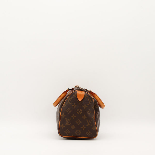 Vue de côté opposé Louis Vuitton Speedy 25 languette cadenas vachette — AMANA Vintage