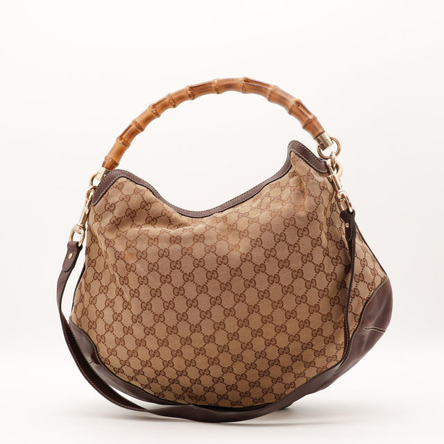 Détail cuir marron bordures Gucci Hobo Bambou occasion authentique — AMANA Vintage