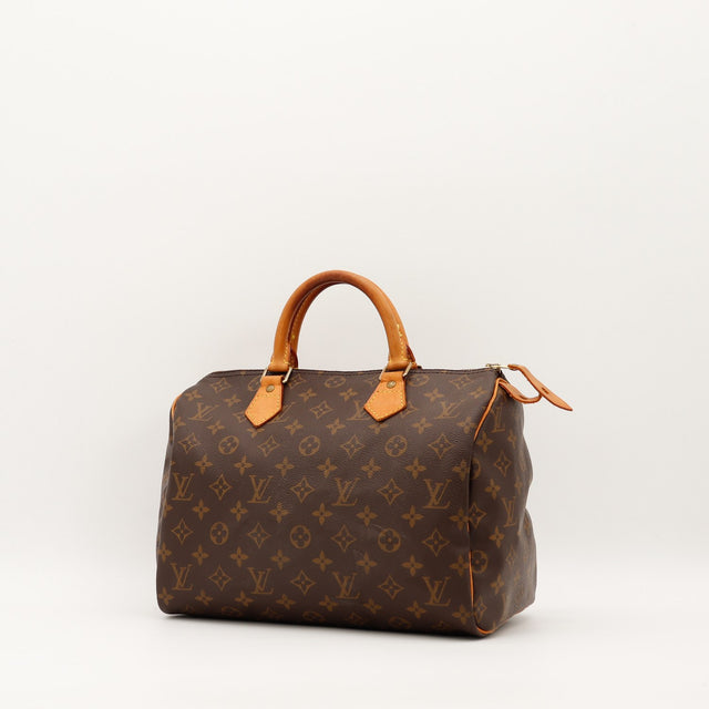Louis Vuitton Speedy 30 vue de trois quarts toile monogramme cuir vachette caramel — AMANA Vintage