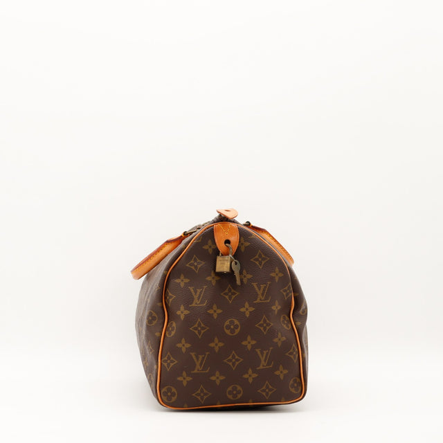 Vue de profil droit Louis Vuitton Speedy 35 cadenas et clé inclus — AMANA Vintage