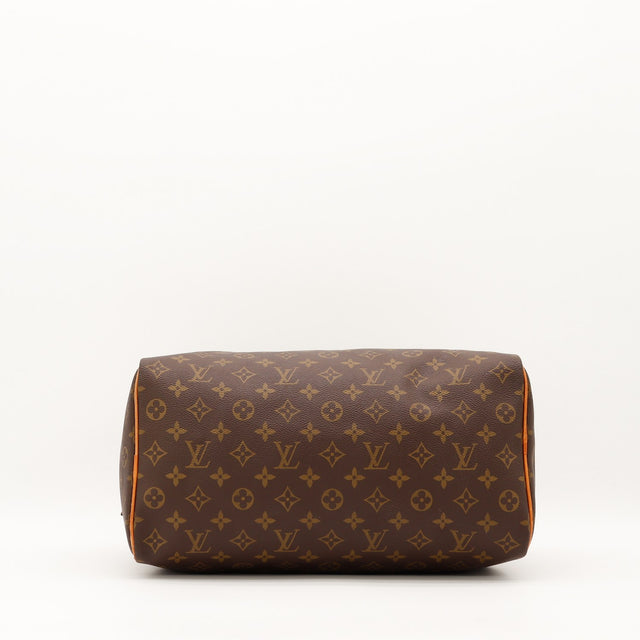 Vue dessous Louis Vuitton Speedy 35 toile Monogram fond — AMANA Vintage