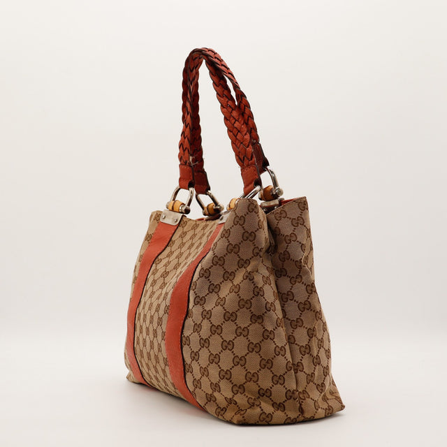 Vue de côté gauche Tote Bag Bamboo Gucci cuir tressé rouge brique — AMANA Vintage