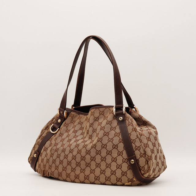 Vue de dos Gucci Abbey D-Ring toile monogrammée beige occasion authentique — AMANA Vintage
