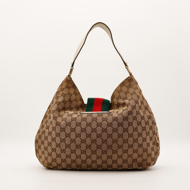 Gucci Hobo Web vue de profil droit détail structure souple occasion authentique — AMANA Vintage